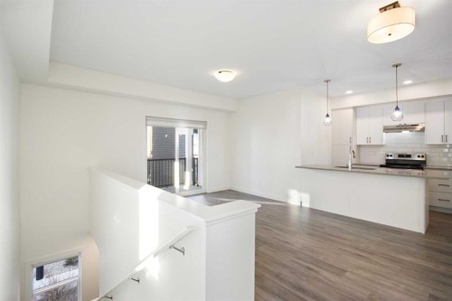 1301-24 Rivercrest Drive, Cochrane, AB - Indoor Photo Showing Kitchen