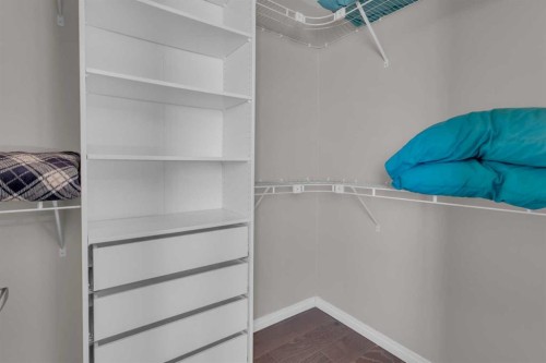 605-620 Luxstone Landing Sw, Airdrie, AB - Indoor Photo Showing Bedroom