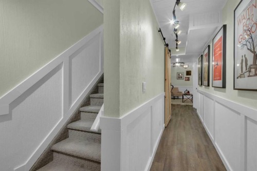 605-620 Luxstone Landing Sw, Airdrie, AB - Indoor Photo Showing Living Room With Fireplace