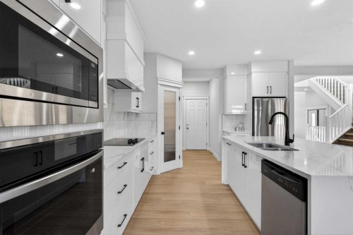 314 Evanston Drive Nw, Calgary, AB - Indoor Photo Showing Kitchen With Double Sink With Upgraded Kitchen
