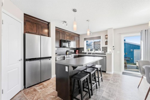 93 Auburn Meadows View Se, Calgary, AB - Indoor Photo Showing Kitchen With Double Sink