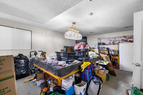 1016 Hunterdale Place Nw, Calgary, AB - Indoor Photo Showing Other Room