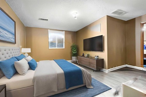 1016 Hunterdale Place Nw, Calgary, AB - Indoor Photo Showing Bedroom