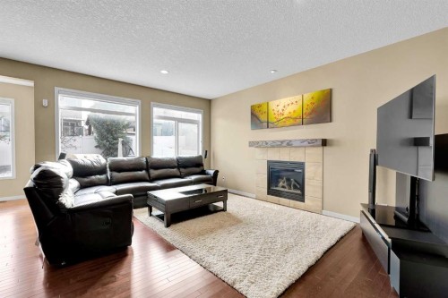 88 Nolanfield Crescent Nw, Calgary, AB - Indoor Photo Showing Living Room With Fireplace