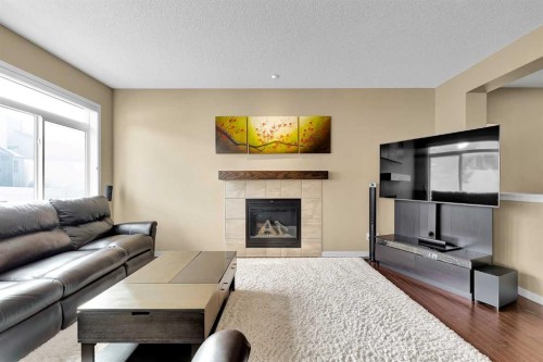 88 Nolanfield Crescent Nw, Calgary, AB - Indoor Photo Showing Living Room With Fireplace