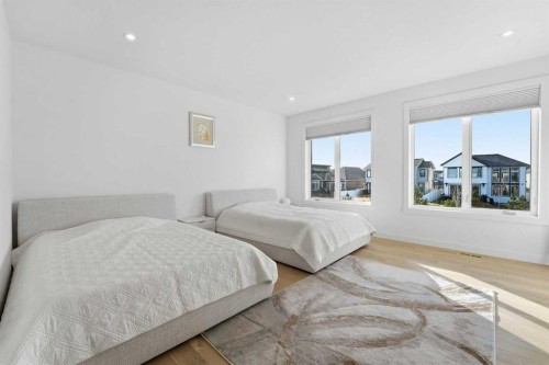 65 Rowmont Link Nw, Calgary, AB - Indoor Photo Showing Bedroom