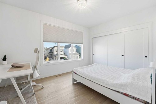 65 Rowmont Link Nw, Calgary, AB - Indoor Photo Showing Bedroom