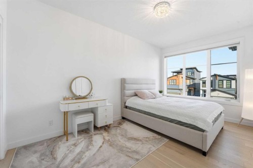 65 Rowmont Link Nw, Calgary, AB - Indoor Photo Showing Bedroom