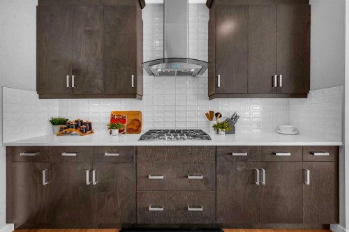 660 Reynolds Crescent Sw, Airdrie, AB - Indoor Photo Showing Kitchen