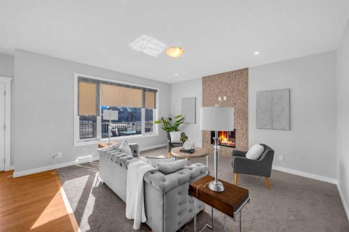 660 Reynolds Crescent Sw, Airdrie, AB - Indoor Photo Showing Living Room