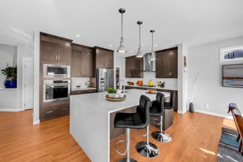 660 Reynolds Crescent Sw, Airdrie, AB - Indoor Photo Showing Kitchen With Upgraded Kitchen