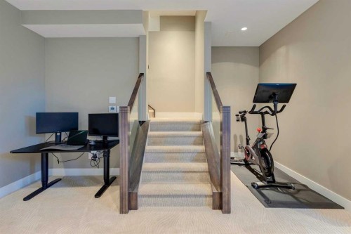 933 32 Street Nw, Calgary, AB - Indoor Photo Showing Gym Room
