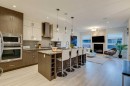 933 32 Street Nw, Calgary, AB  - Indoor Photo Showing Kitchen With Fireplace With Upgraded Kitchen 