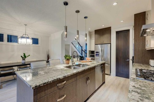 933 32 Street Nw, Calgary, AB - Indoor Photo Showing Kitchen With Double Sink With Upgraded Kitchen