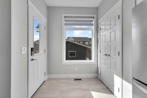 41 Sunrise Heights, Cochrane, AB - Indoor Photo Showing Other Room