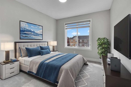 41 Sunrise Heights, Cochrane, AB - Indoor Photo Showing Bedroom