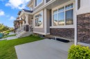 41 Sunrise Heights, Cochrane, AB  - Outdoor With Facade 