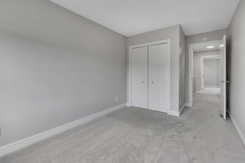 41 Sunrise Heights, Cochrane, AB - Indoor Photo Showing Other Room