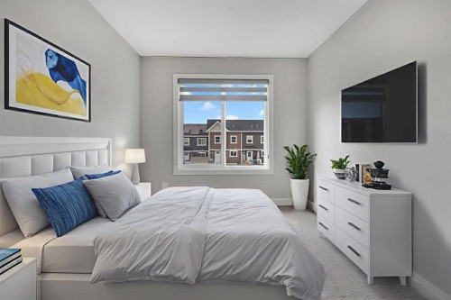 41 Sunrise Heights, Cochrane, AB - Indoor Photo Showing Bedroom
