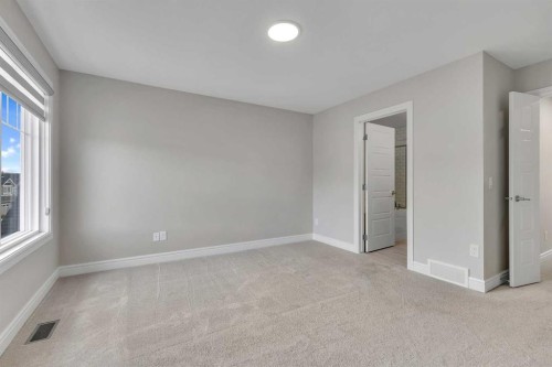41 Sunrise Heights, Cochrane, AB - Indoor Photo Showing Other Room