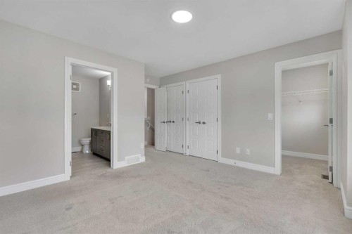 41 Sunrise Heights, Cochrane, AB - Indoor Photo Showing Other Room