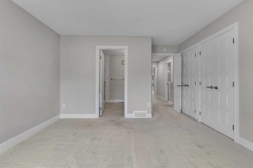 41 Sunrise Heights, Cochrane, AB - Indoor Photo Showing Other Room