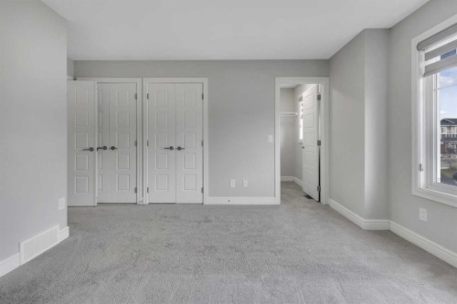 41 Sunrise Heights, Cochrane, AB - Indoor Photo Showing Other Room