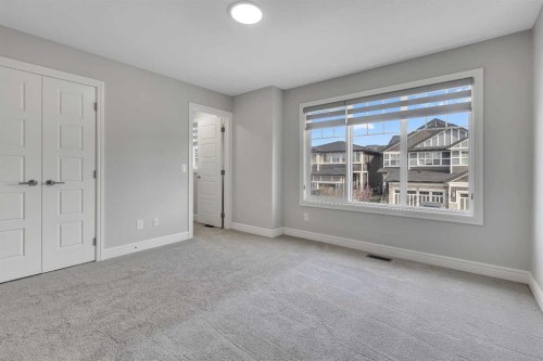 41 Sunrise Heights, Cochrane, AB - Indoor Photo Showing Other Room