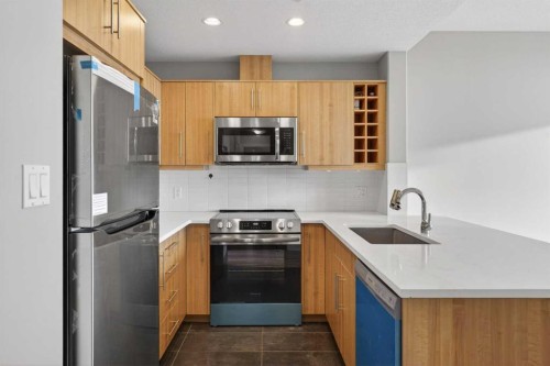 1205-55 Spruce Place Sw, Calgary, AB - Indoor Photo Showing Kitchen With Stainless Steel Kitchen With Upgraded Kitchen
