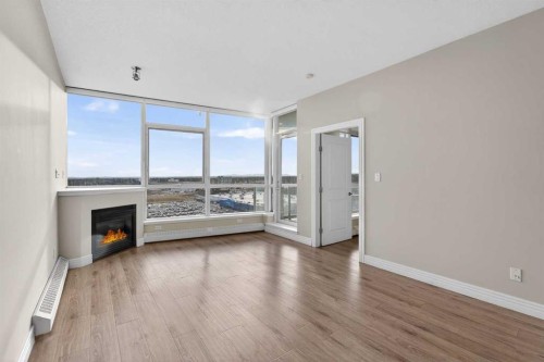1205-55 Spruce Place Sw, Calgary, AB - Indoor With Fireplace