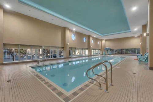 1205-55 Spruce Place Sw, Calgary, AB - Indoor Photo Showing Other Room With In Ground Pool