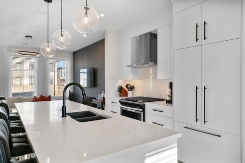 7813 Spring Willow Drive Sw, Calgary, AB - Indoor Photo Showing Kitchen With Double Sink With Upgraded Kitchen