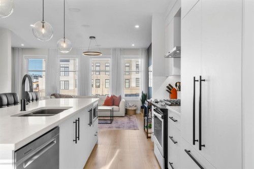 7813 Spring Willow Drive Sw, Calgary, AB - Indoor Photo Showing Kitchen With Double Sink With Upgraded Kitchen