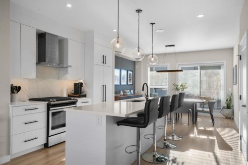 7813 Spring Willow Drive Sw, Calgary, AB - Indoor Photo Showing Kitchen With Upgraded Kitchen