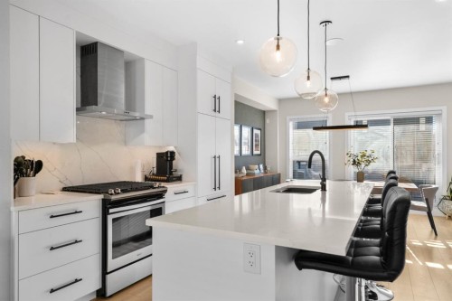 7813 Spring Willow Drive Sw, Calgary, AB - Indoor Photo Showing Kitchen With Upgraded Kitchen