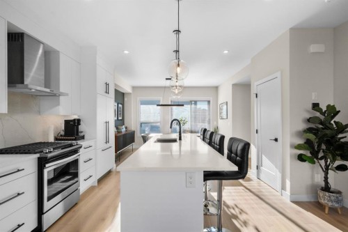7813 Spring Willow Drive Sw, Calgary, AB - Indoor Photo Showing Kitchen With Upgraded Kitchen