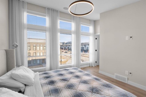 7813 Spring Willow Drive Sw, Calgary, AB - Indoor Photo Showing Bedroom