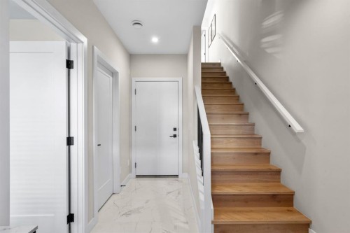 7813 Spring Willow Drive Sw, Calgary, AB - Indoor Photo Showing Other Room