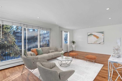 810-3130 66 Avenue Sw, Calgary, AB - Indoor Photo Showing Living Room