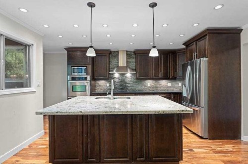 810-3130 66 Avenue Sw, Calgary, AB - Indoor Photo Showing Kitchen With Stainless Steel Kitchen With Upgraded Kitchen