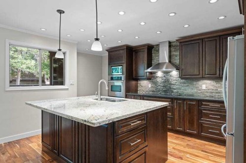 810-3130 66 Avenue Sw, Calgary, AB - Indoor Photo Showing Kitchen With Double Sink With Upgraded Kitchen