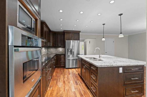 810-3130 66 Avenue Sw, Calgary, AB - Indoor Photo Showing Kitchen With Stainless Steel Kitchen With Upgraded Kitchen