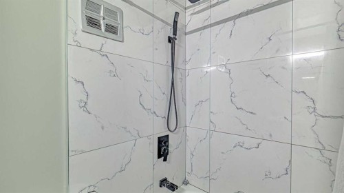 152 Oaktree Lane Sw, Calgary, AB - Indoor Photo Showing Other Room