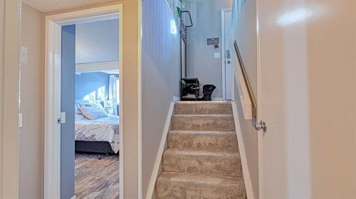 152 Oaktree Lane Sw, Calgary, AB - Indoor Photo Showing Other Room