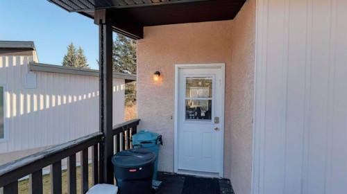 152 Oaktree Lane Sw, Calgary, AB - Outdoor With Exterior