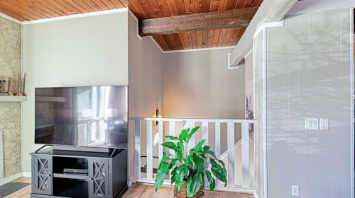 152 Oaktree Lane Sw, Calgary, AB - Indoor Photo Showing Other Room