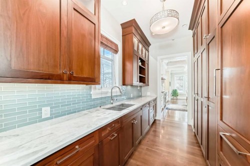 67 Rosery Drive Nw, Calgary, AB - Indoor Photo Showing Kitchen With Double Sink With Upgraded Kitchen