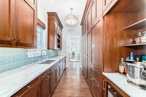 67 Rosery Drive Nw, Calgary, AB - Indoor Photo Showing Kitchen With Double Sink