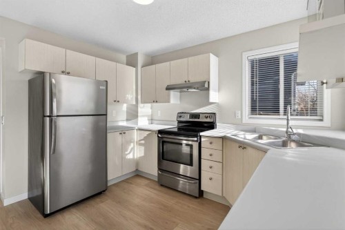 186 Harvest Rose Circle Ne, Calgary, AB - Indoor Photo Showing Kitchen With Double Sink