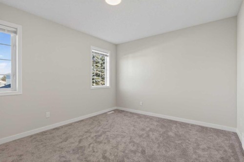 186 Harvest Rose Circle Ne, Calgary, AB - Indoor Photo Showing Other Room